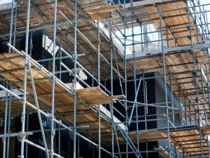 a big building with installed scaffolding indicating scaffolding safety